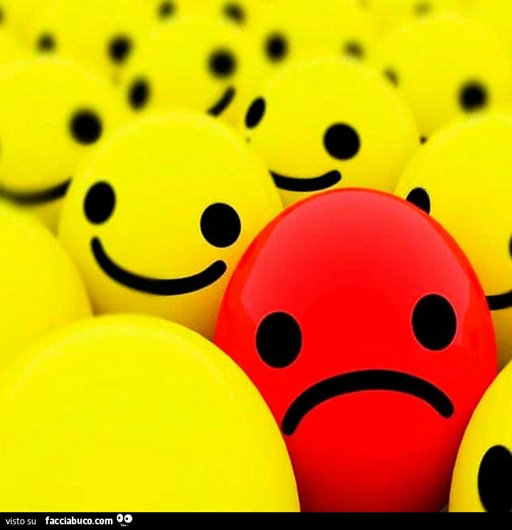 Smile triste in mezzo a sorridenti
